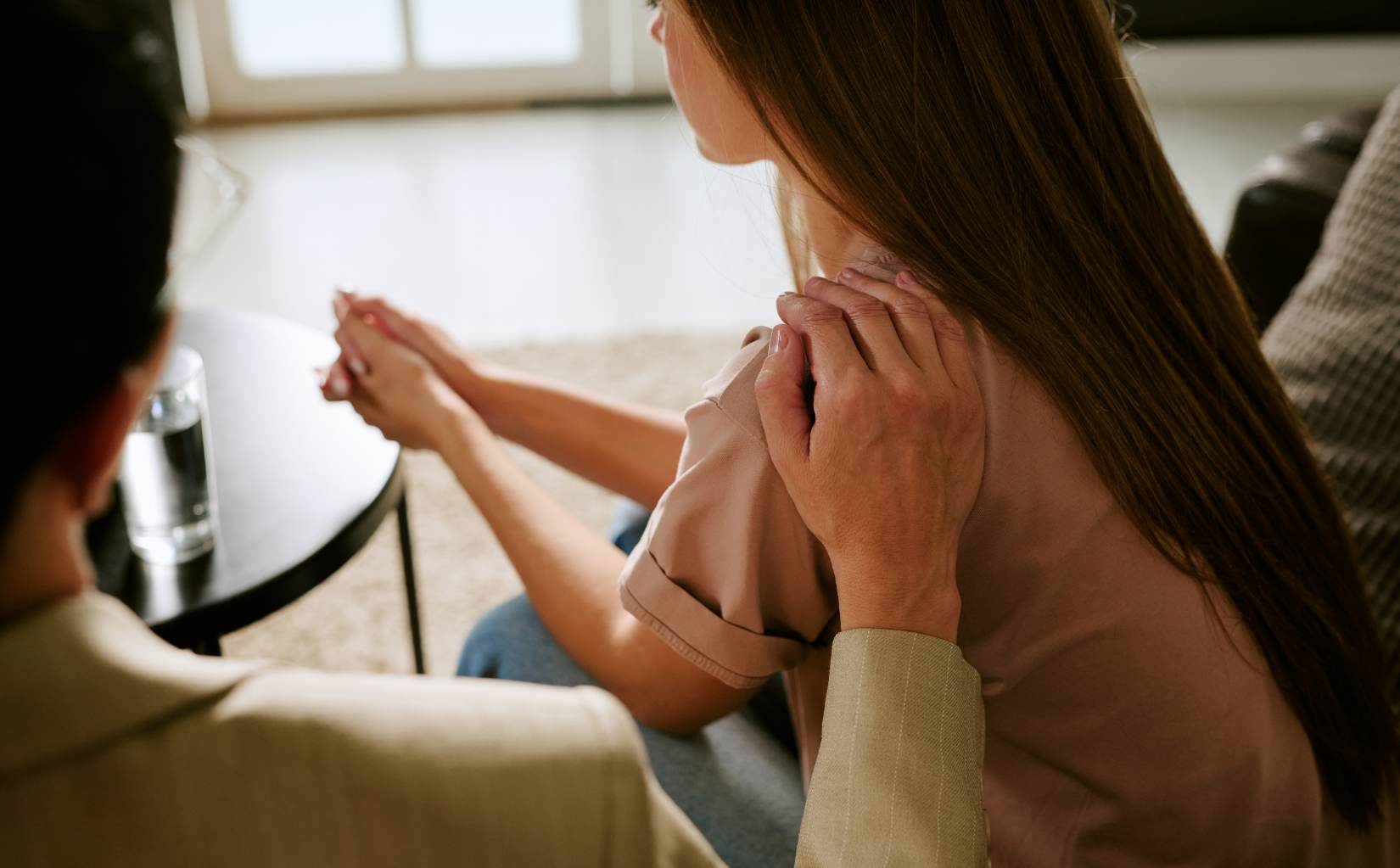 Man processing emotions during individual therapy in PTSD treatment in Massachusetts.