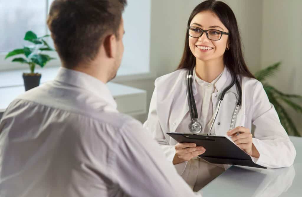 Doctor helping a patient adjust their treatment plan through medication management in Massachusetts.