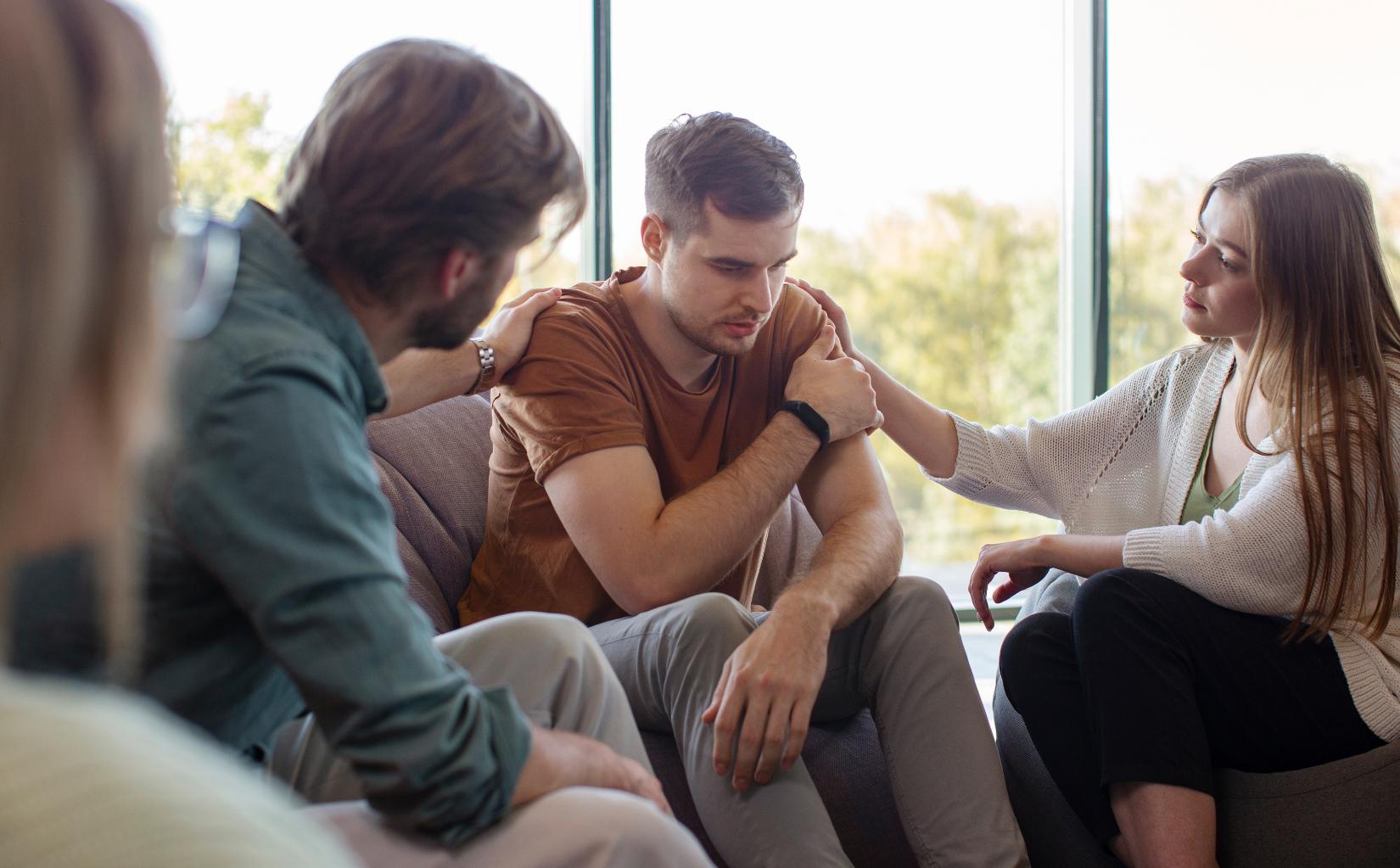 Man processing emotions during individual therapy in PTSD treatment in Massachusetts.