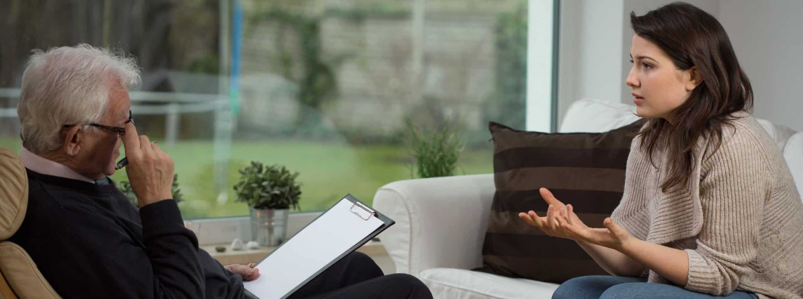 Client speaking with a therapist during trauma treatment in Massachusetts.
